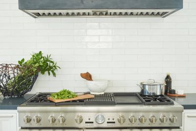 stove with subway tile backsplash