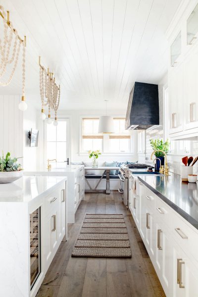 white kitchen with pendant lights